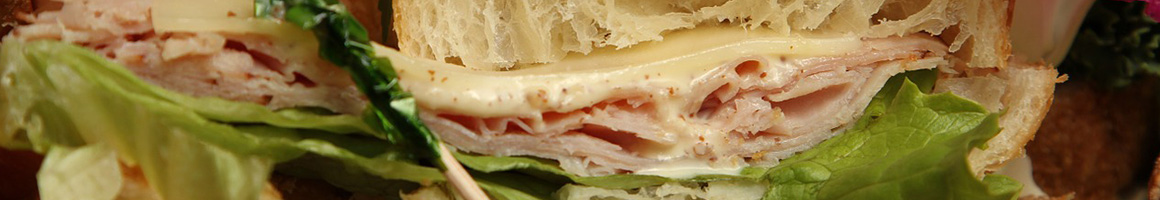 Eating Sandwich Cafe at Cafe Zoe restaurant in Menlo Park, CA.